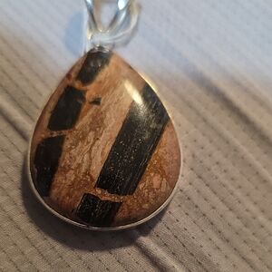 Elegant Black and Brown Teardrop Tire Sterling Silver Track Jasper Pendant.